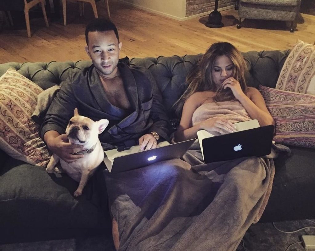 John Legend and Chrissy Teigen hanging out at home