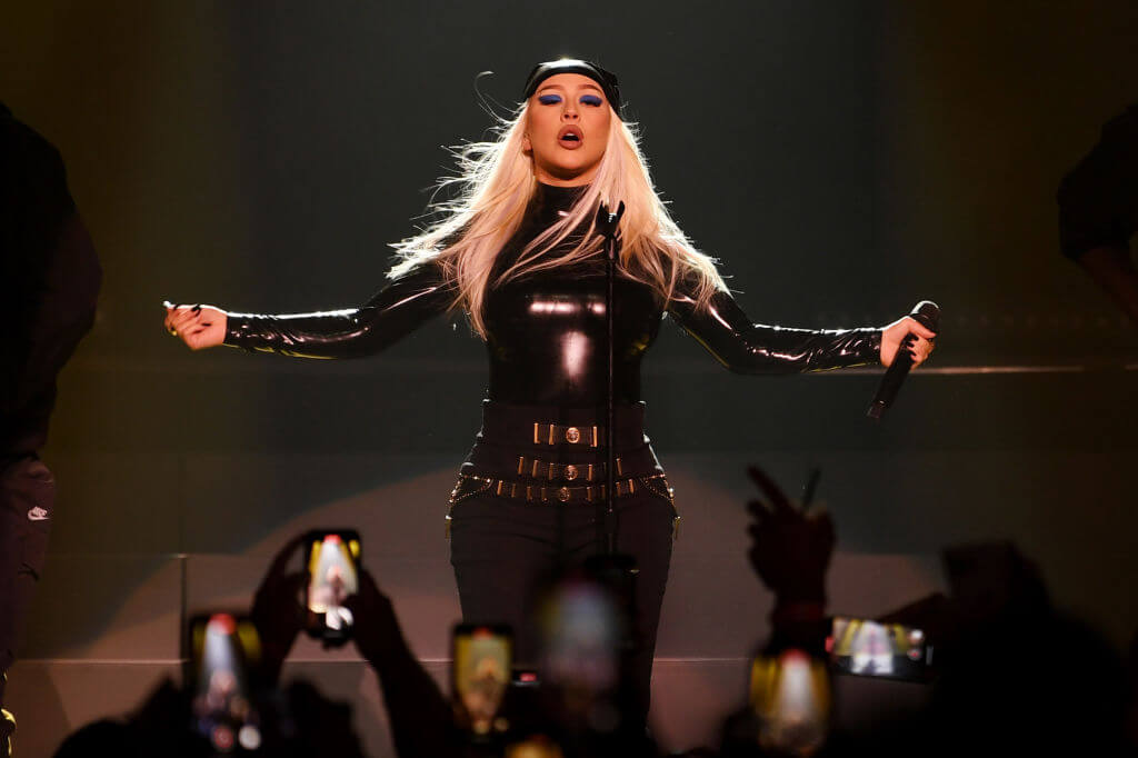 Christina Aguilera performs in sexy catsuit