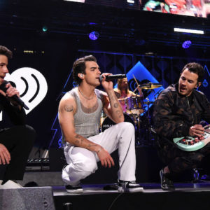 Nick, Joe, and Kevin Jonas perform at the iHeartRadio Z100 Jingle Ball 2021