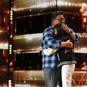 Madison Baez hugging her father after earning the Golden Buzzer