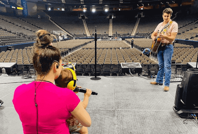 Gabby Barrett and Cade Foehner on stage