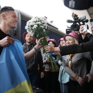 Ihor Didenchuk of the Kalush Orchestra is welcomed home to Kyiv