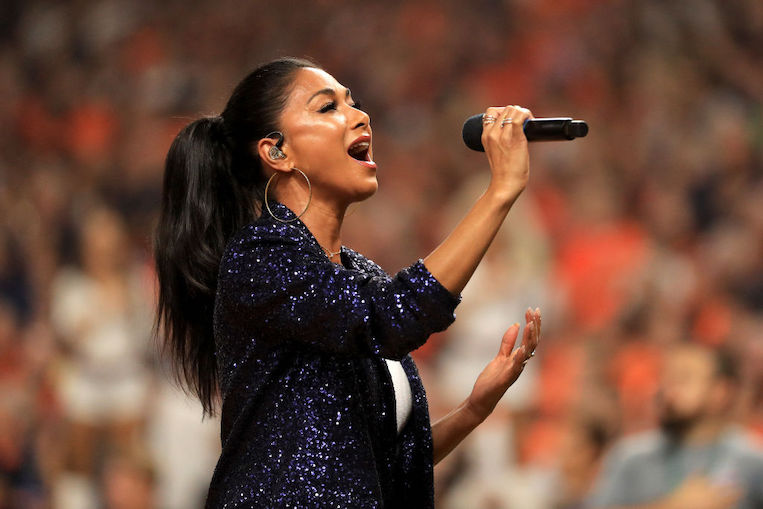 Nicole Scherzinger performs the National Anthem at a Baseball Game