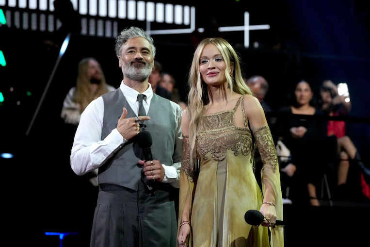 Rita Ora and Taika Waititi speak onstage during the MTV Europe Music Awards 2022