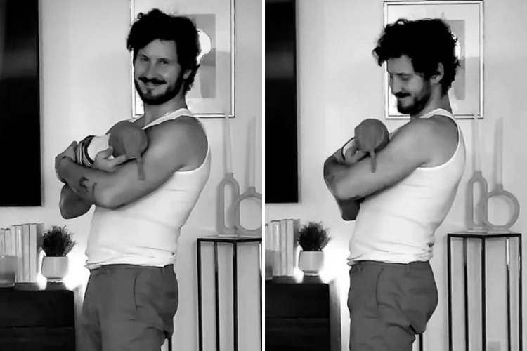 Val Chmerkovskiy holding his child
