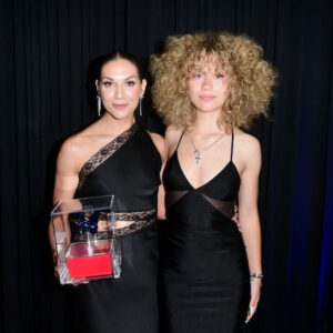 Allison Holker and Weslie Fowler accept an award on behalf of Stephen tWitch Boss