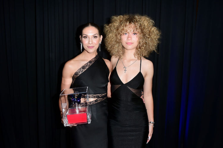 Allison Holker and Weslie Fowler accept an award on behalf of Stephen tWitch Boss