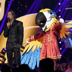 Nick Cannon and Macaw on 'The Masked Singer'